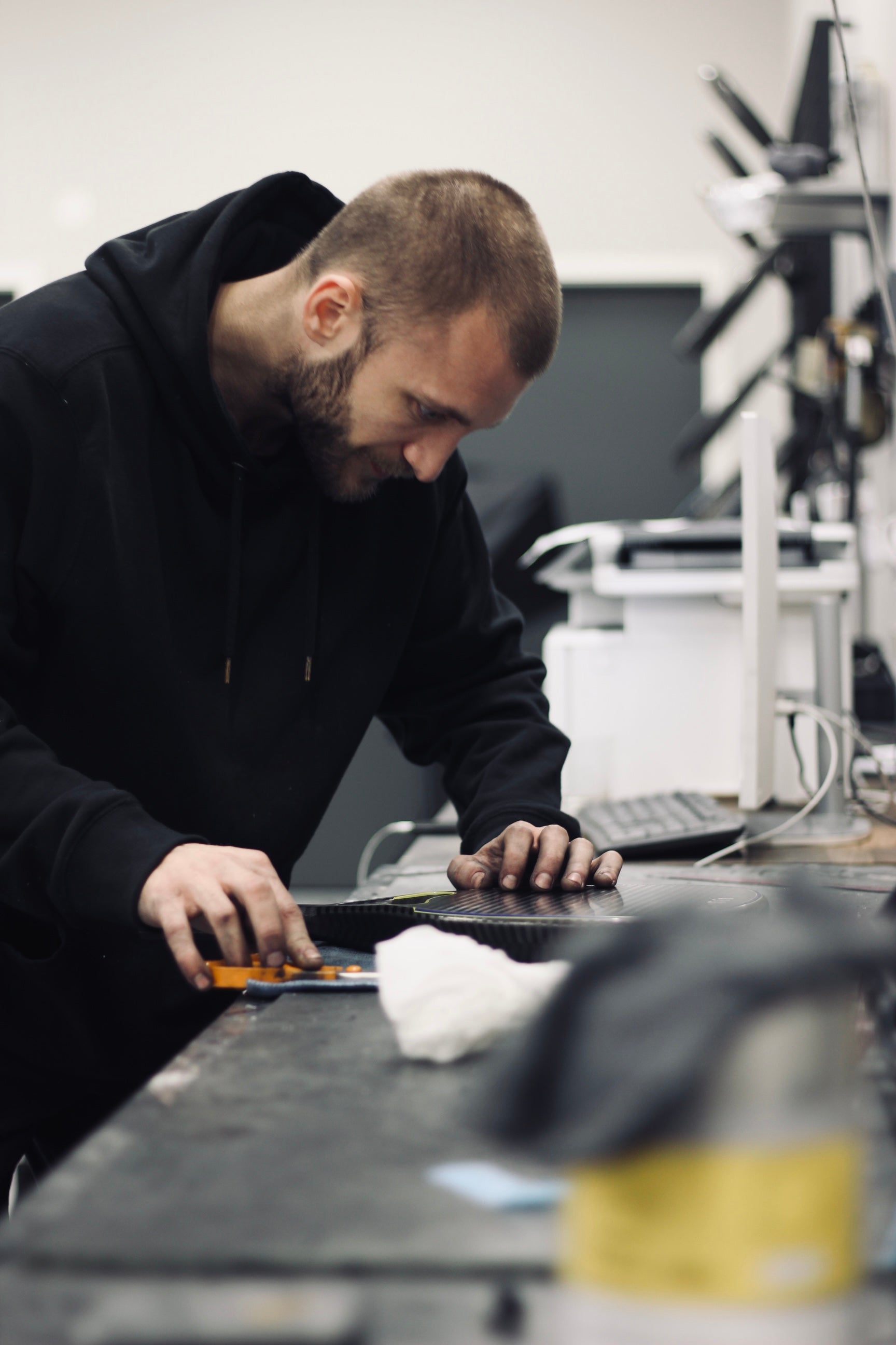 man building carbon fiber padel racket